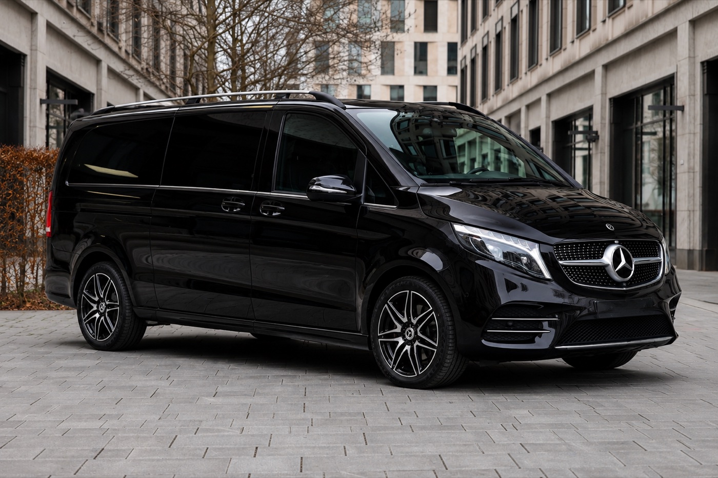 Black Mercedes-Benz V-Class premium van in an urban setting
