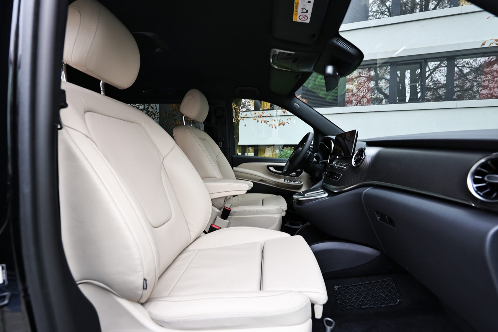 Cream leather front cabin inside a Mercedes-Benz V-Class